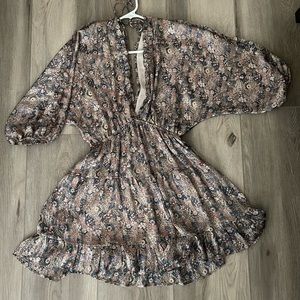 Vici Ruffled tiered babydoll dress. Size Medium. V shape at front and back.